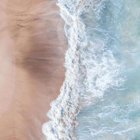 Sand dunes meeting the ocean