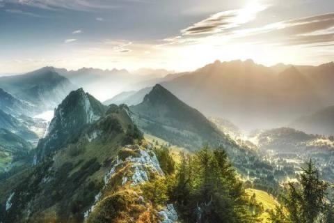 Sunrise over a steep mountain range